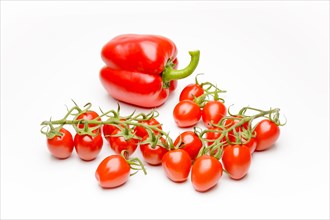 Mini panicles tomatoes with red pepper (Capsicum annuum)