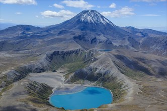 Aerial view of the blue lake before Mount Ngauruhoe