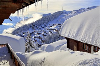 Village view with snow-covered houses
