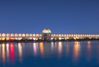 Illuminated Imam square with Lotfollah mosque during blue hour
