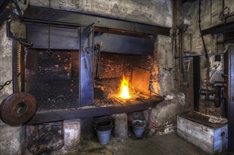 Old forge with fireplace