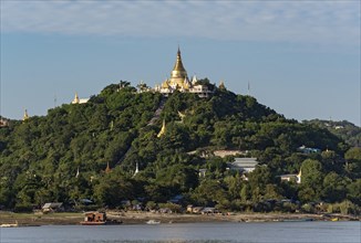 Gilded pagoda on Sagaing hill at Irrawaddy River