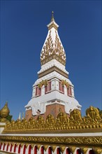 Gilded wall in front of the Chedi of Wat Phra That Phanom