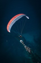 Paraglider over the Atlantic Ocean near La Caleta