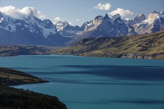 Turquoise glacial lake Lago del Toro in front of the mountain range Cuernos del Paine