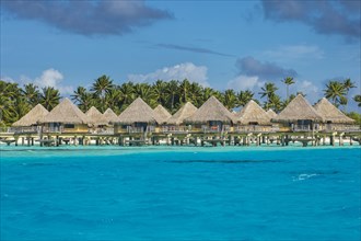 Overwater bungalows in luxury hotel