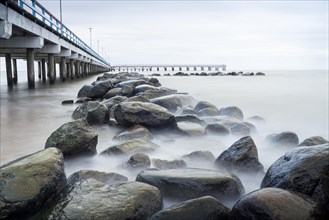 Coastal rocks with pier