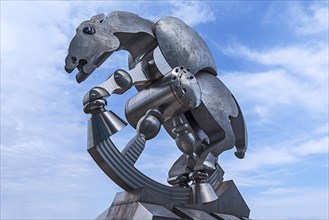 Sculpture Rolling Horse made of stainless steel by German sculptor Jurgen Goertz