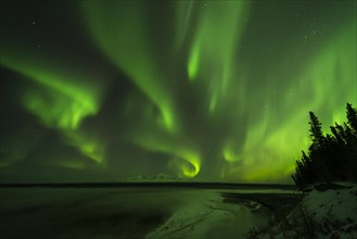Aurora over the Copper River and the distant peaks of Wrangell Mountains