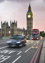 Taxi and red double-decker bus on the Westminster Bridge