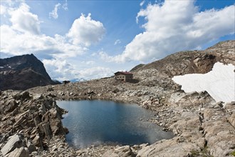 Mountain lake with Rieserferner hut