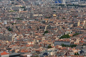 View from Notre-Dame de la Garde over the city with the church Saint-Vincent de Paul, Marseille
