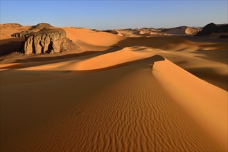 Sanddunes and rock towers at Moul Naga