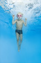 Little boy with swimming goggles