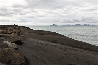 Dune of lava sand with view to the Westman Islands