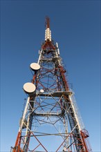 Radio tower with radio dishes and antennas