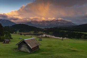 Small hut on mountain meadow with Geroldsee