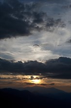 Paraglider flying over Ammertal