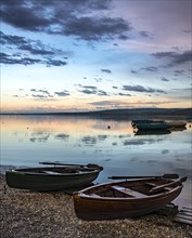 Two rowing boats by the lake