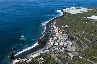 La Bombilla with black lava beach and lighthouse