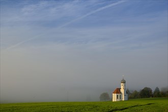 St. Johannisrain near Penzberg in the morning fog of Upper Bavaria