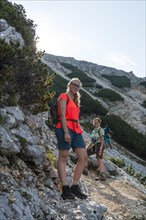 Two female hikers on trail