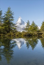 Snow-covered Matterhorn reflected in the lake