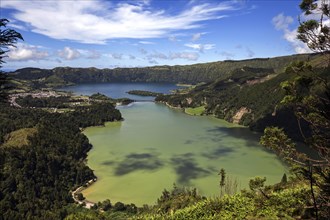 View of the volcanic crater Caldera Sete Cidades with the crater lakes Lagoa Verde and Lago Azul