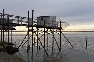 Traditional fishing huts built on stilts on the Gironde