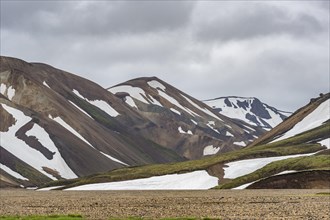 Rhyolite mountains with snow residues Landmannalaugar