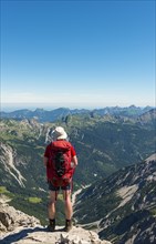 Hiker views of mountains and Alps
