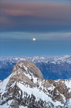 Santis Mountain overlooking Alpstein massif at full moon