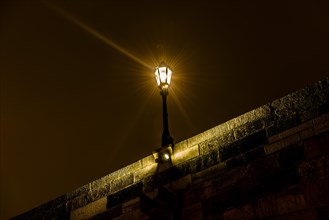 Old street lamp lit