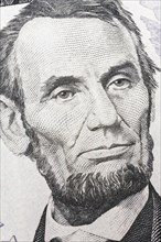 Portrait of Abraham Lincoln on a US five dollar bill