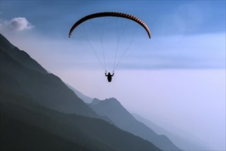 Paraglider over Lake Garda in Malcesine