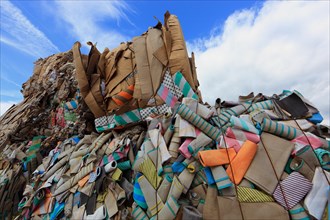 Waste paper for recycling in a recycling plant