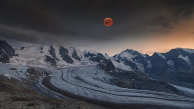 Panoramic view of the Bernina Group with blood moon