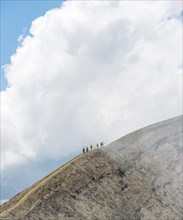 People walking on crater rim