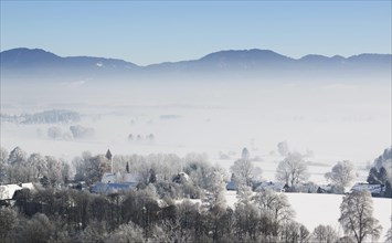 Morning fog in winter over Loisachtal
