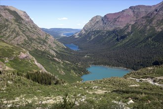 Mountain landscape at Grinnell Glacier Trail with View of Grinnell Lake