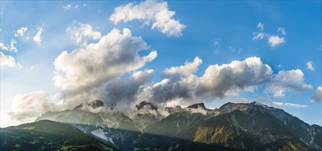 Alpine panorama with clouds