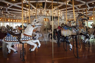 Historical children's merry-go-round with horses