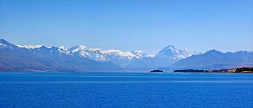 Deep blue glacial Lake Pukaki with mountains