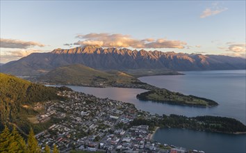 View of Lake Wakatipu and Queenstown at sunset