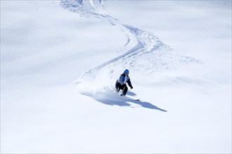 Lonely skier in deep powder snow