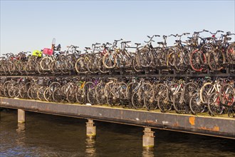 Bicycle parking lot on the river Het IJ
