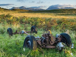 Car wreck on sheep pasture near Portree