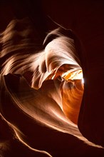 Light through heart shaped sandstone formation