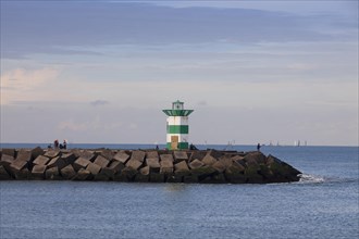 Small lighthouse at harbor entrance