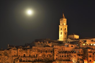 Medieval old town with cathedral at full moon
